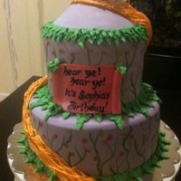 Tangled Rapunzel Cake Pink tinted vanilla cake with vanilla frosting-- purple mmf fondant with hand painted vines and flowers, vanilla hand piped leaf-accents,...