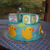 Ducks With Umbrellas This cake was for my best friend's first baby shower. The inspiration came from several pics of cakes I saw online. This was my first...