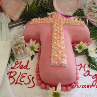 Commuion Cake cake covered in fondent with fondant pearls