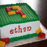 Lego 8 inch square cake decorated to mimic legos.