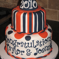 Graduation Cake This cake was created for 2 young ladies graduating from high school. Letters & #'s were cut using Tappits (whew that took a...