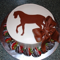 Chocolate Strawberry Horse Cake This cake was for our Horsemasters club! Its a WASC cake with strawberry filling, vanilla buttercream and garnished with chocolate covered...