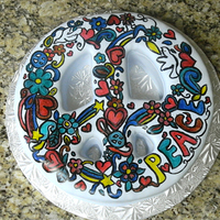 Peace Birthday Cake This cake was created for a birthday party. Cake is covered in fondant and hand painted.