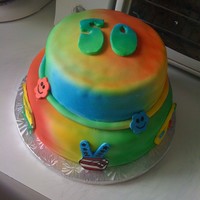Groovy Tie-Dye Birthda Cake Cake was created for a 50th Birthday Celebration. All designs are fondant and bottom tier designs are hand painted. I'll post some...