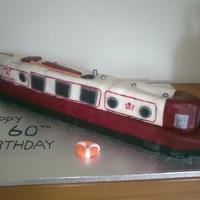 Narrow Boat Narrow boat cake made out of 7 loaf tin sized cakes (it had to feed a lot of people!). This was a joing effort between myself and a friend...