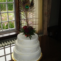 Victorian Cake With Peacock Feather Topper 