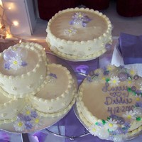 Bubble Wedding Cake The Bride wanted a non-traditional hand blown bubble and flower cake. All the cakes are cheesecake!!