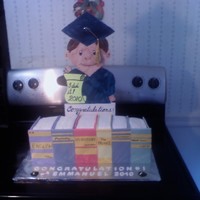 Graduate And His Books Triple layered filled with chantilly cream covered in fondant. Yummy! This is my first novelty cake. came out pretty good considering no...
