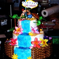 Aloha Luau a luau wedding reception. First cake stacking and making flowers.