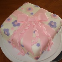 My 1St Fondant Cake Currently taking Wilton's course 3 and just made this cake in class. It was my first time ever touching fondant. Cover and decorations...