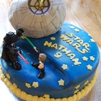 Star Wars Deathstar Birthday Cake Star Wars birthday cake covered in fondant. Death Star is a round cake made using the Wilton ball pan and covered in fondant, decorated...