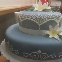 Wilton Course 3 Final Cake This was my final cake for Wilton course 3, and my first ever stacked cake. Royal icing piping on the fondant and the lilies are royal...