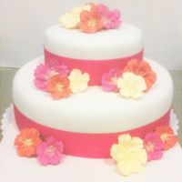 Hibiscus Cake All of the flowers on this cake are royal icing. Apologies for the photo quality - took it on my phone.