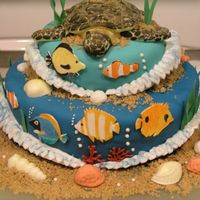 Coral Reef Cake - 1St Attempt This was my final cake for my Wilton Fondant & Gumpaste class. It was 100% inspired by CCers. Sea turtle is all fondant, waves are...