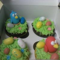 Easter Cupcakes I did a cow because the woman I made these for,her daughter loves cows :-) so I thought I'd just mix that in.P.s The birds and the cow...