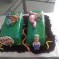 Phineas And Ferb Its a 11 shaped cake (not original plan :-) and the characters are fondant, theres cookie crubs for dirt and.. it ended up being kinda a...
