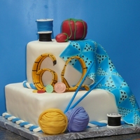 Quilting And Sewing Fondant covered Chocolate cake with buttercream icing. The quilt was airbrushed and then the pattern, haindpainted. Tape measure was also...