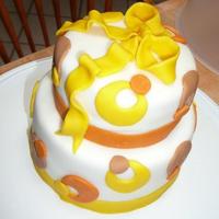 Fall Birthday Bows And Circles This was a "mini" cake made for my father's birthday. It has 6" & 8" tiers. All of the embellishments are...