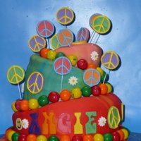 Peace, Daisies And Smiles This cake was made as a surprise for the client's mother on her birthday. She loved a tie-dyed cake with peace signs she had seen and...
