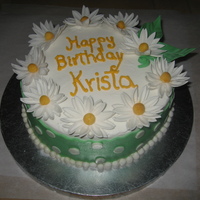 Daisy Chocolate cake with strawberries n cream filling; covered with MMF and gumpaste/fondant daisies.