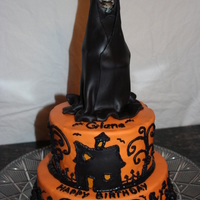 Giana's Halloween Birthday This cake was made for my Grand daughter's Halloween themed Birthday party. This was my first attempt at piping free hand. Decorations...