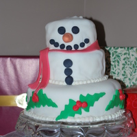 Snowman Cake This is my third cake and my first three tier cake. I just think it is so adorable. Everyone loved it!