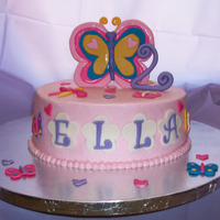 Butterflies & Dragonflies Yellow cake, chocolate BC filling, BC, MMF decorations.