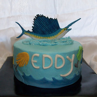Deep Sea Fishing Chocolate cake with chocolate filling, BC, all decor made from MMF. Fish are painted with edible paint.