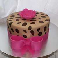Leopard Cake I made this for my own birthday! Chocolate cake, Nutella BC filling, Chocolate ganache, MMF, flower, ribbon & bow made from MMF &...