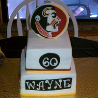 Fsu BC with fondant accents. The topper is all hand-cut and took me FOREVER to make as I'd never done anything like this before!