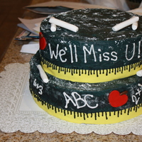 Principal Retirement Cake Our lovely principal retired so I made her a cake. This is butter cream with fondant decor.