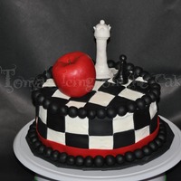 Twilight Themed Birthday Cake This is a Twilight birthday cake for a girl turning 14. Buttercream icing with fondant decorations. The apple & chess pieces are 100%...