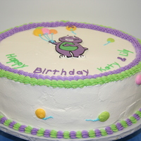 Barney Fbct Birthday Cake I thought I had dodged the Barney bullet when my kids were younger, but now he's back...lol. This is a 2 layer 14in marbled cake iced...