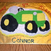 Tractor tractor cake mold with whipped icing