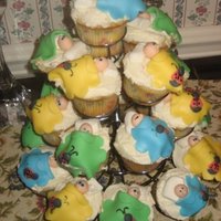 Baby Shower Tower These were for a baby shower. Yellow cake with raspberry filling and buttercream frosting. Blankets, baby heads and ladybugs are all...