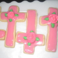 Cross Cookies Rolled butter cookies with corn syrup icing and royal icing ribbon roses