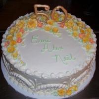 50Th Birthday 14" round butter cake, vanilla frosting with butter cream flowers and fondant 50