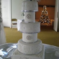 Winte Wonderland Wedding Cake They asked for big, and they asked for a winter wonderland shimmery snowflake look. It was my first time using styrofoam spacers. 12 inch...