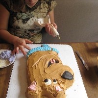 Scooby-Doo I made this cake for my neighbor, she gave me the pan to make it, and I decorated it, I was only 12 years old when I made this cake.