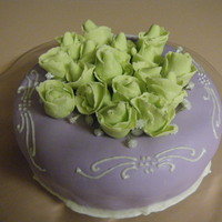 Lime Green Rose Buds My first attempt with sugarpaste... and thus my first attempt at rose buds as well. I learned a lot from it that's for sure :)