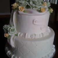 Wilton Gumpaste & Fondant Course Final Cake Gumpaste roses on fondant covered cake. Fondant had a diamond grid pattern with pearls. Top layer has a fondant drape effect covered in...