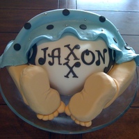 Blue Blanket Diaper Baby Shower Cake Carved an 8 inch cake and covered it in white MMF. The Legs and Feet were carved from green floral foam and then covered in Fondant....