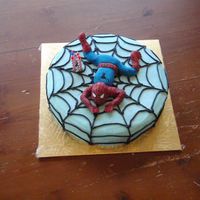 Spiderman Cake This was for my son's birthday at daycare. Made spiderman a week ahead so he cracked a little! Cake was banana with buttercream icing...