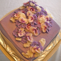 My Very First Order :-) White chocolate with blueberry fillings and buttercream frosting.