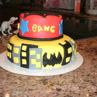 Superhero Cake My son turned 3 and really loves superheros. I took many ideas from other cakes here on cc. It covered in fondant and fondant accents.