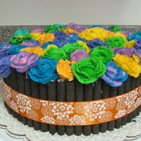 Spring Brilliance Chocolate cake with butter cream filling. Top is butter cream flowers. Started off as roses but as I went along, I just started mixing...