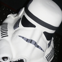 Stormtrooper Helmet Cake 15" tall 18" long, chocolate cake with chocolate ganache, Face Guard made from rice cereal! White piping dots on base really...