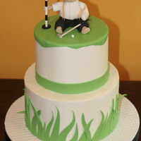 Golf Tournament Baby Shower Smooth Buttercream cake, Vanilla cake with strawberry bc filling. Fondant decorations, and hand sculpted baby in golf attire. Baby made...