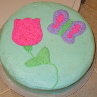 1St Decorated Cake This is a single layer yellow cake with bc icing. I used cookie cutters for my pattern but really need to work on them stems & leaves....