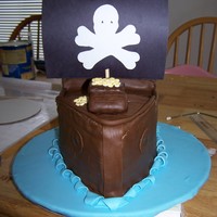 Pirate Ship 3 layer chocolate cake. I did this in a few hours for a friend as a favor. The mast and the sail are not edible, if I had time I would have...